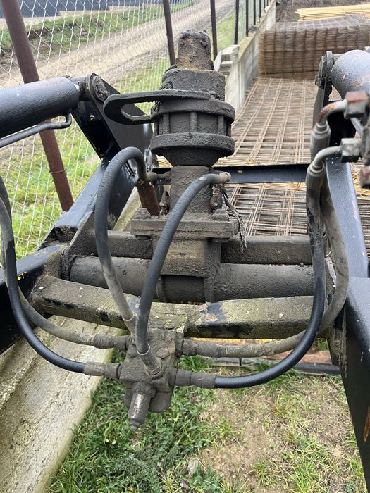 Cupa buldoexcavator komatsu graifer cu cap rotativ