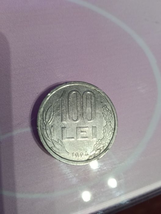 Vând moneda veche de 100