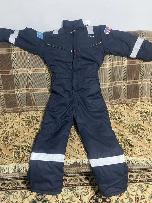 Продается Тшо зимные комбезы