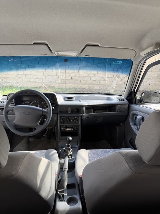 Nexia 1 DOHC 2006 yil kam probegli yangi holatda