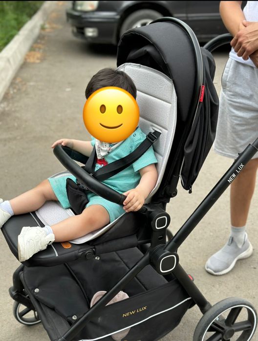 Детская прогулочная коляска