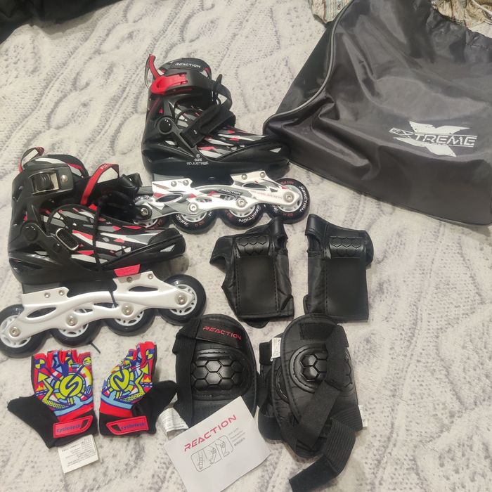 Коньки роликовые