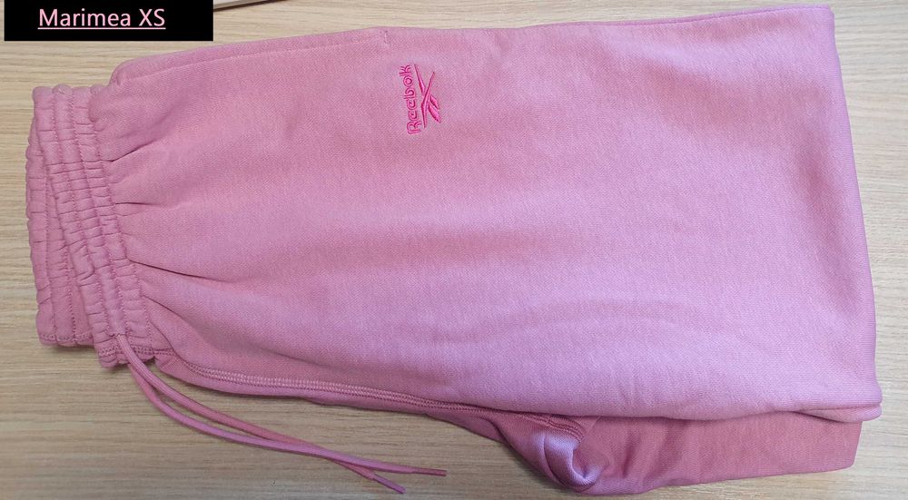 Pantaloni trening femei roz 100075640 Reebok FRENCH TERRY marimea XS