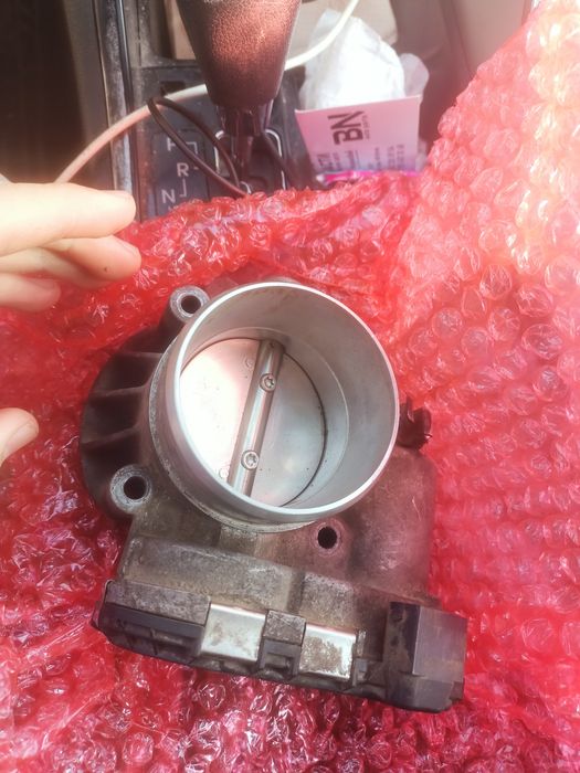 Дроссельная заслонка