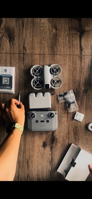 Дрон DJI Neo Fly More Combo серый