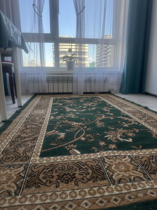 Продается  ковер размером 1,30 м на 2,15 м