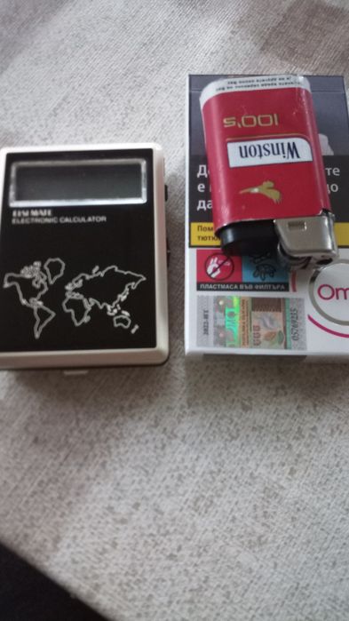 Калкулатор "Sharp" със часовник