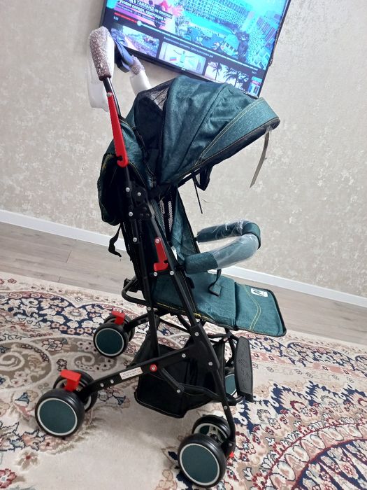 Продам новую коляску чемодан