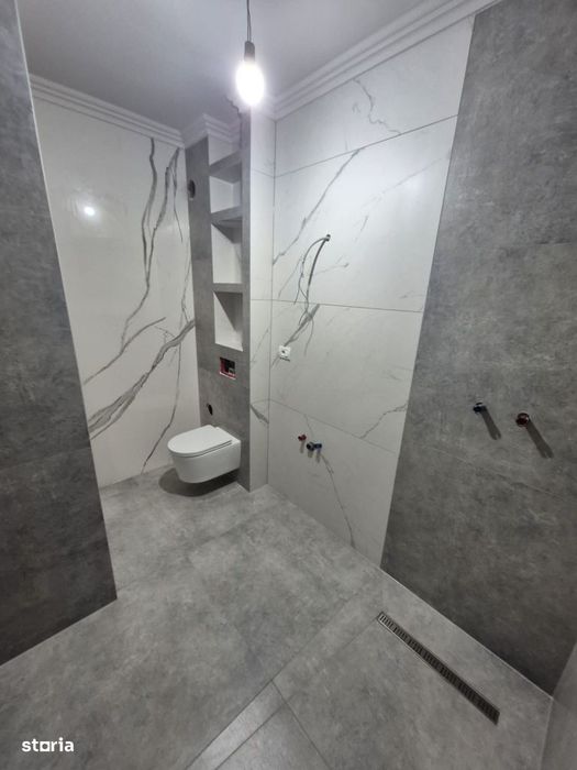 Apartament la parter  nou în Grădiște deosebit cu centrală proprie