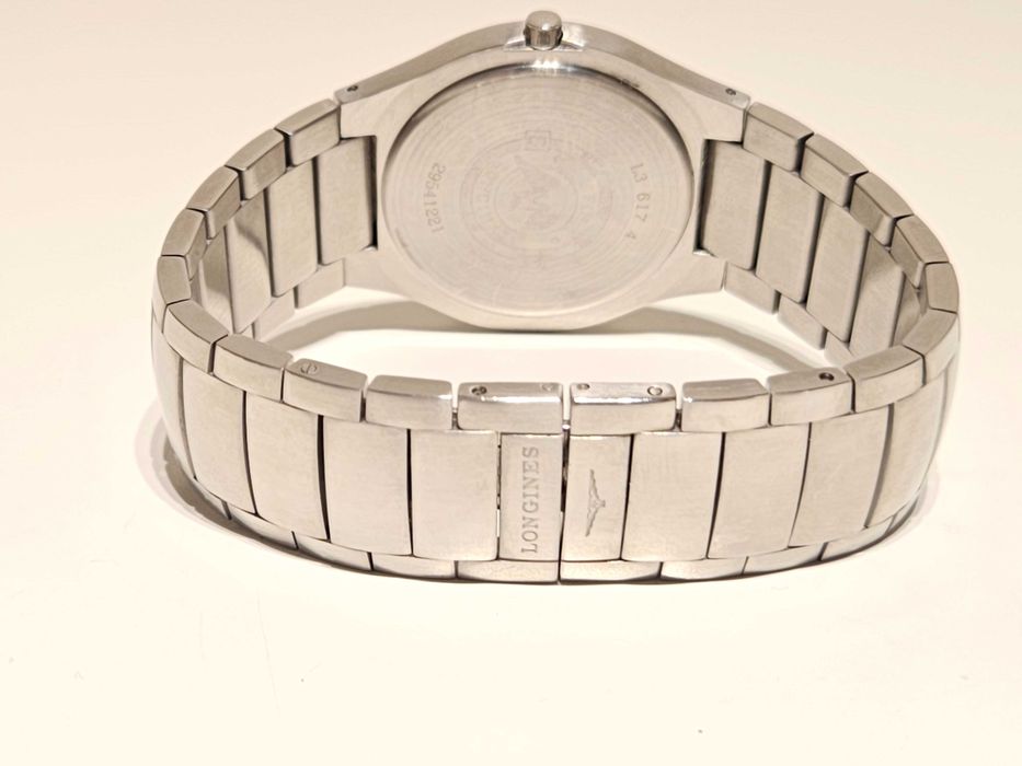 Продаван елегантен стомана кварц мъжки  дамски часовник"Longines"