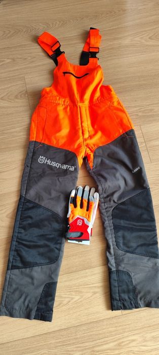 Pantaloni și mănuși protecție Husqvarna