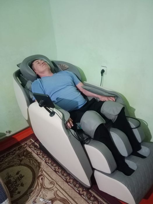 Массажный кресло