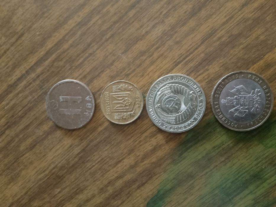 Продам манету не дорого