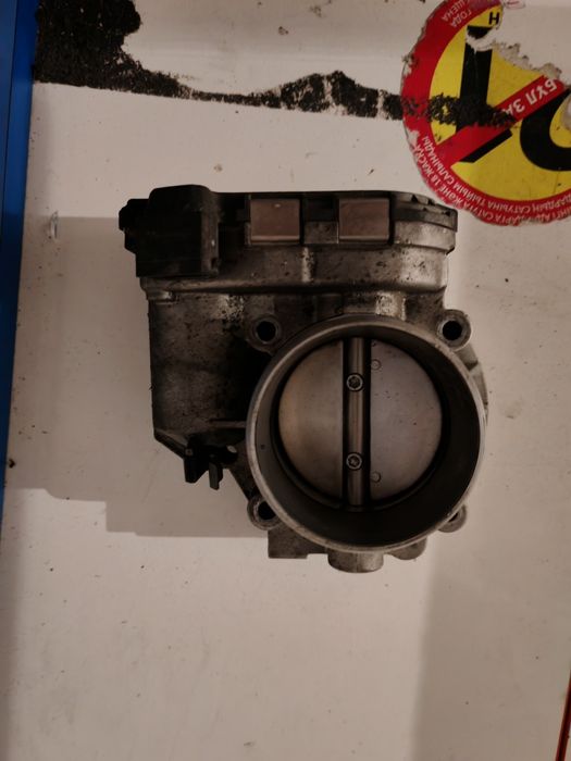 Дросельный заслонка