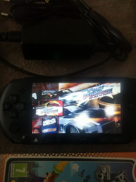 Игра PSP Е 1004 черно