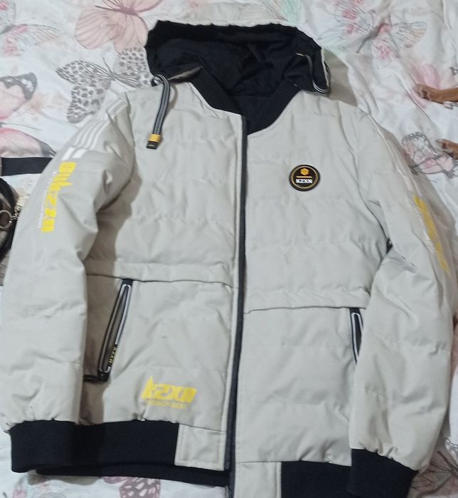 Куртка двухсторонняя качественная.  На подростка