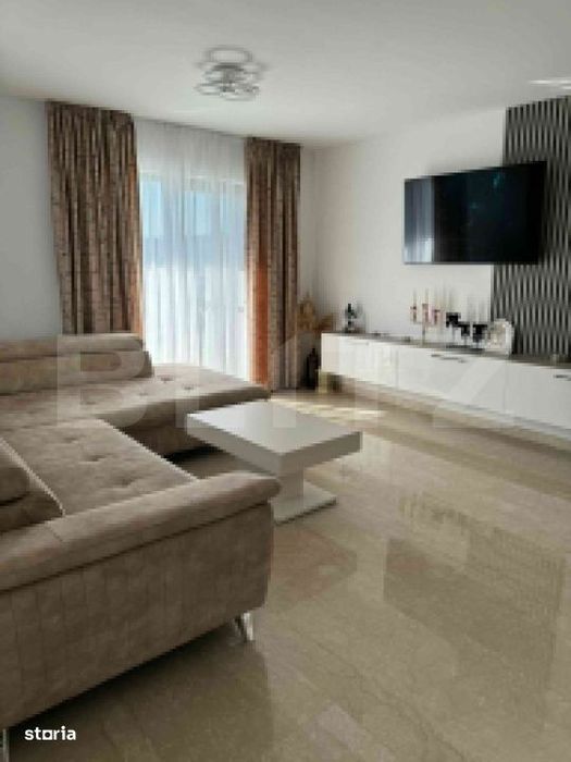 Apartament cu 3 camere in suprafata de 110 si un teren de 400 mp