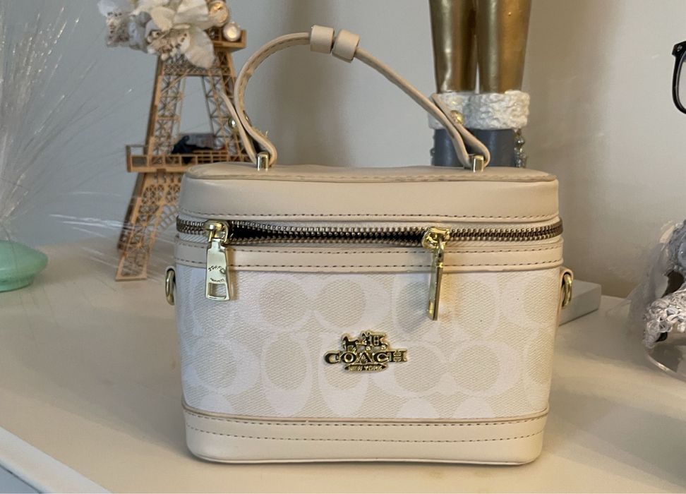 Маленькая сумка коач