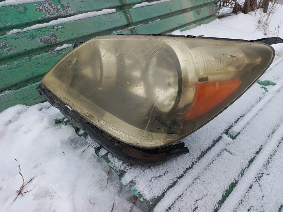 Хонда Одиссей фара левая