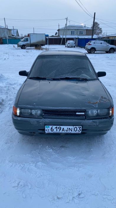 Мазда 323BG 1990