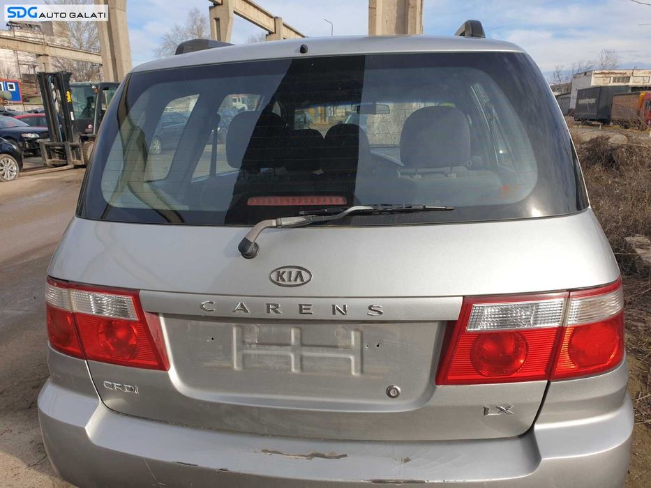Ornament Bandou cu Suport Lampi Numar si Maner Clapeta Actionare Deschidere Kia Carens 1999 - 2006
