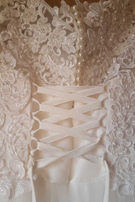 Rochie de mireasa marimea 46, cu talie reglabila,stare impecabila.