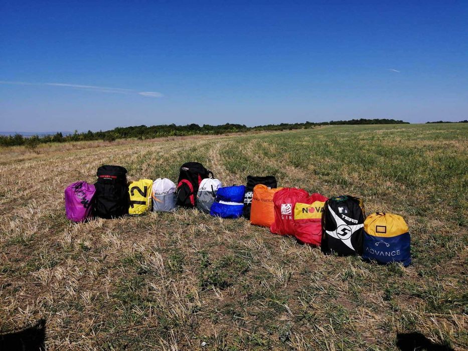 парапланери,парапланер ,,запасни парашути,парамотори,сбруи