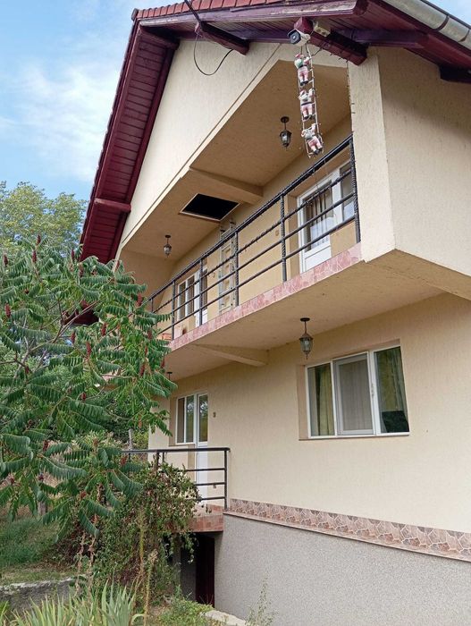 Casă + anexă gospodărească + teren Curtea de Argeș