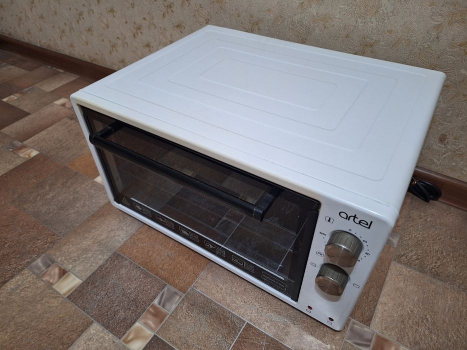 Электропечь artel.