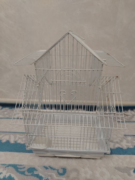 Продам клетку для мелких попугаев