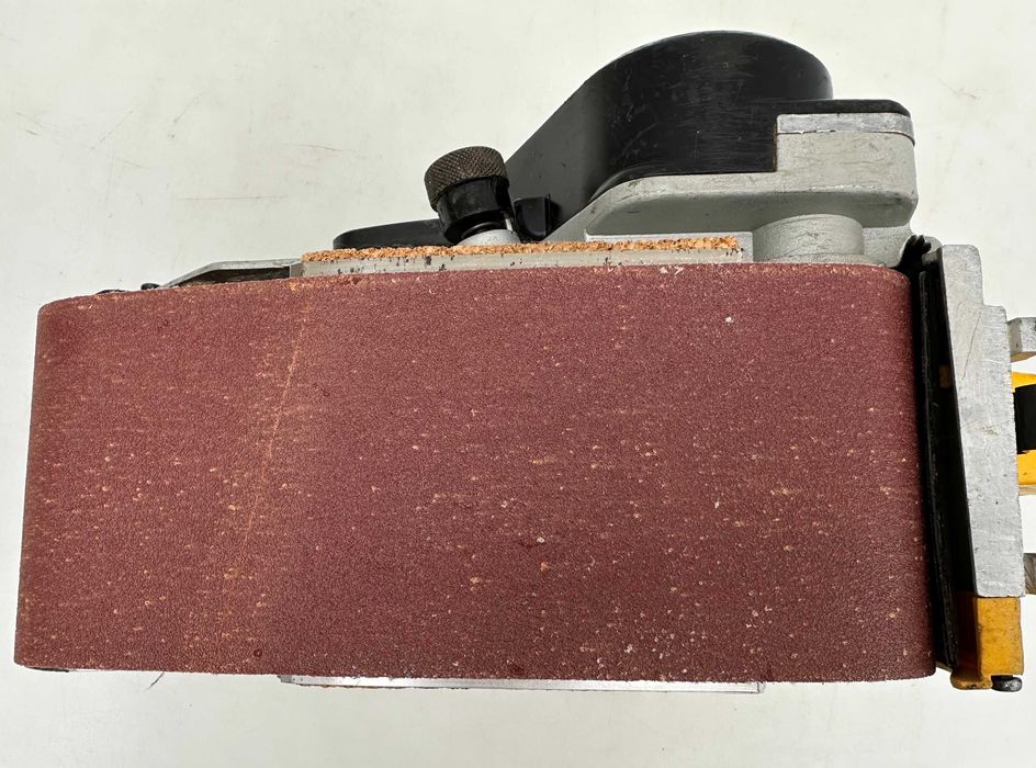 DeWALT DW650-QS - Професионален лентов шлайф 1010W