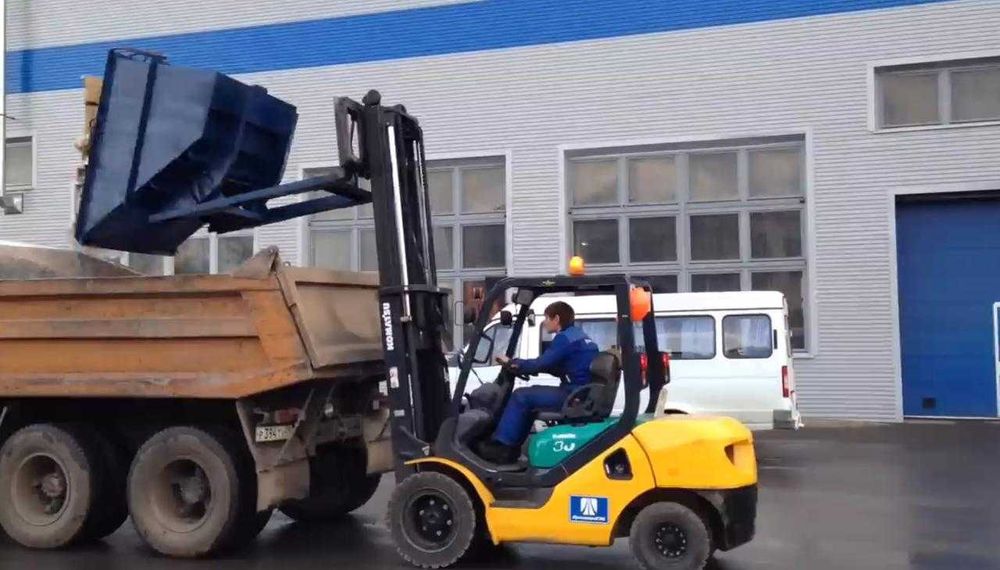 Контейнер саморазгружающийся для вилочного погрузчика.