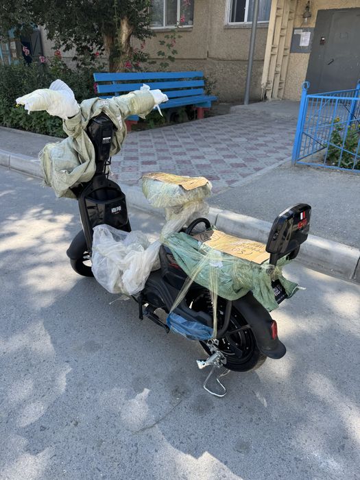 Электроскутер новый в упоковке. Электровелосипед новый. Жап жана