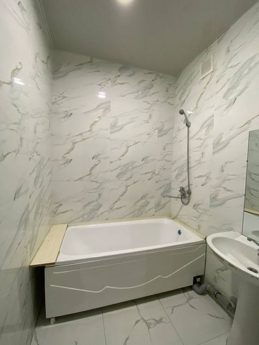 2/2/16. Спутник 16А, Янгихает р-н (Сергели). Новостр-ка, квартира 67м²