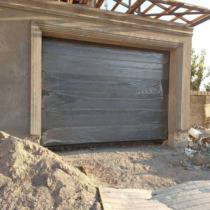 Электрические секционные ворота для дома. Автоматика Erreka.