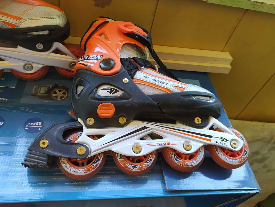 Роликовые коньки