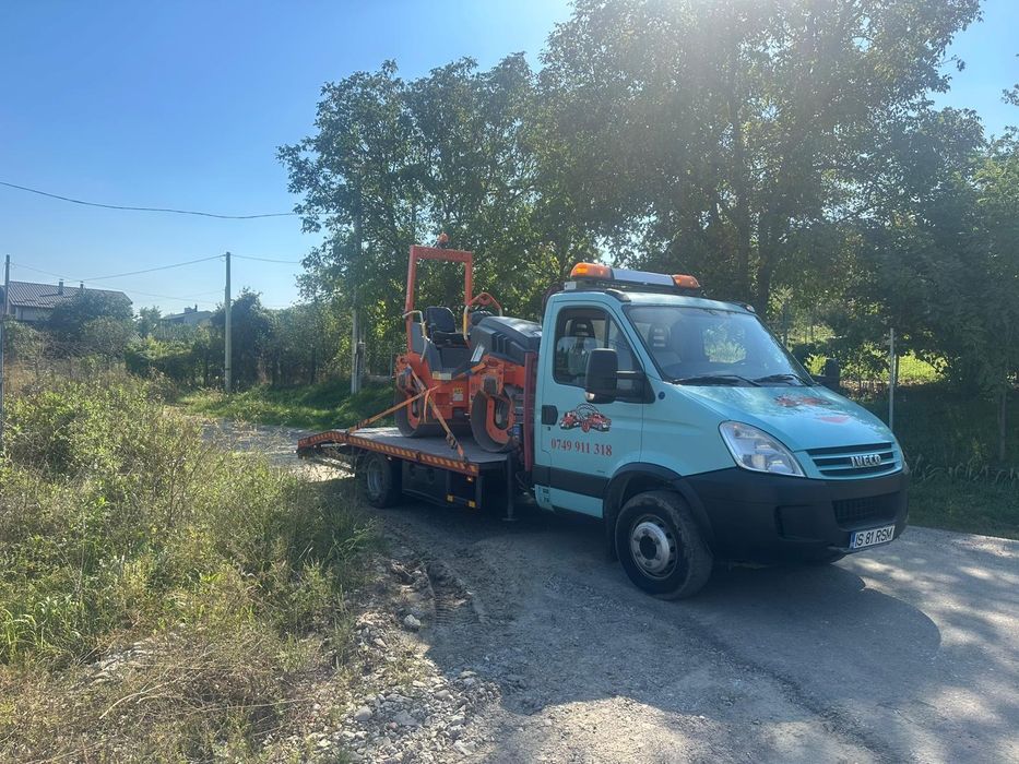 Platforma Iveco cu macara și troliu