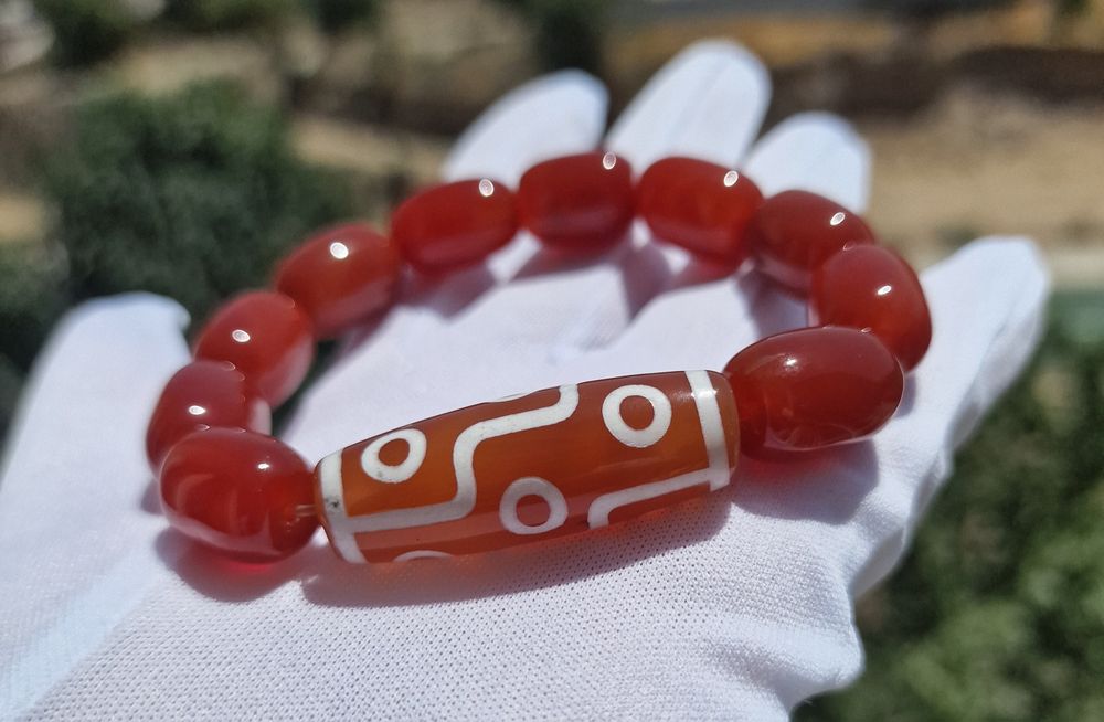 Браслеты с Бусинами Дзи.