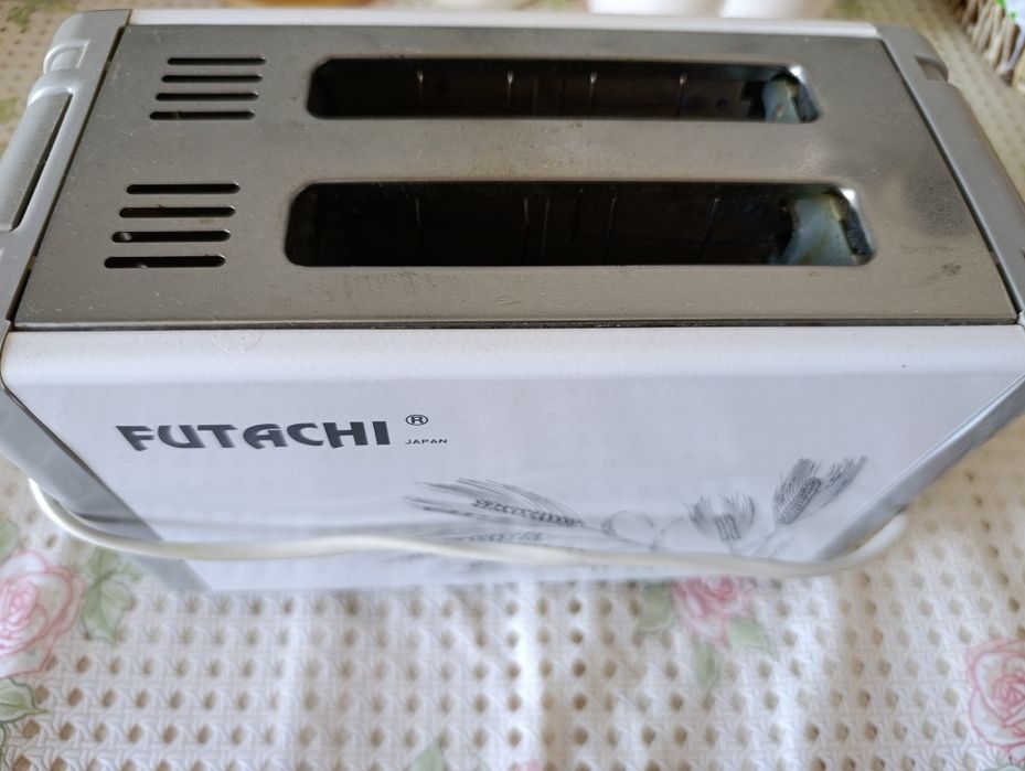 Продам Тостер FUTACHI