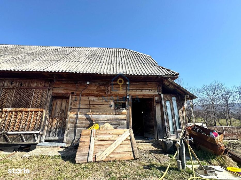 Casa de caramida de vanzare Surdesti cu teren intravilan 5000mp