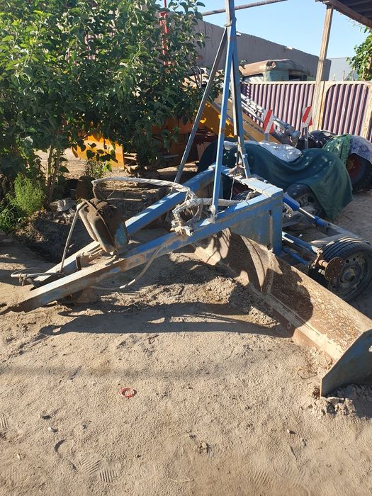 MTZ 80.1 lazerni yer tekislagichi bilan