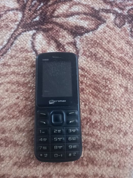 Продам телефон Micromax x1800