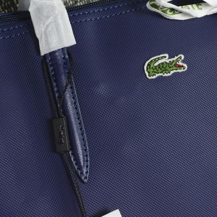 Сумка Lacoste.