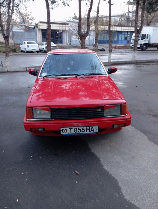 Мазда 323 фамилия