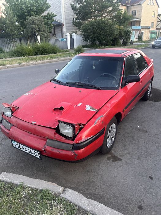 Мазда 323 слепая