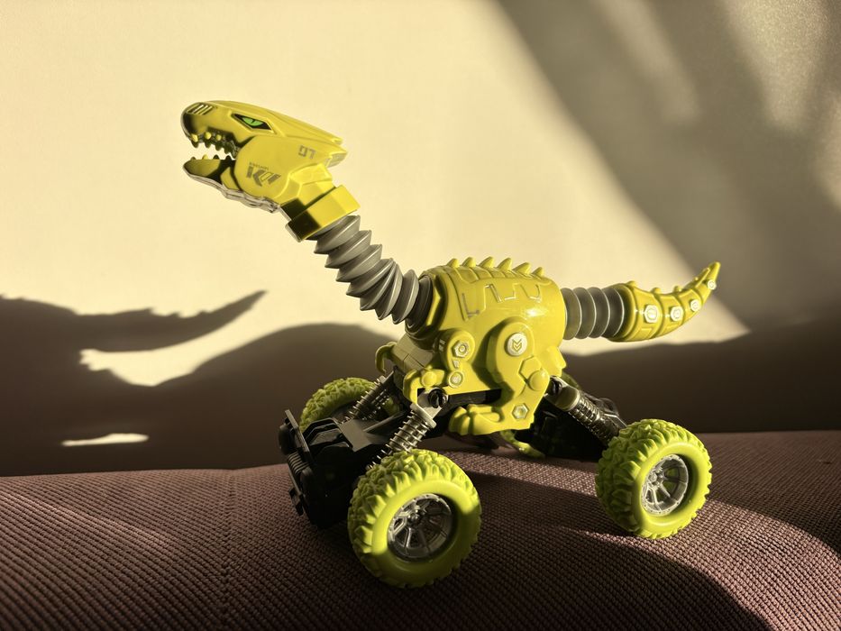 Mașinuță dinozaur cu roți mari vehicul de jucărie