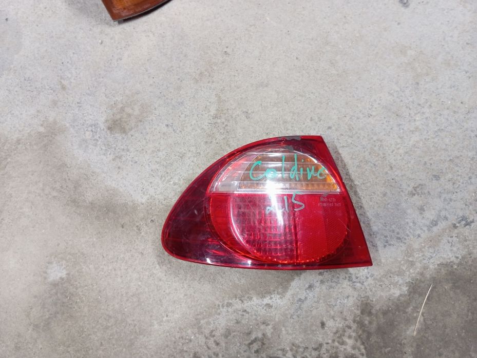 Фонарь задний левый Toyota Caldina 215