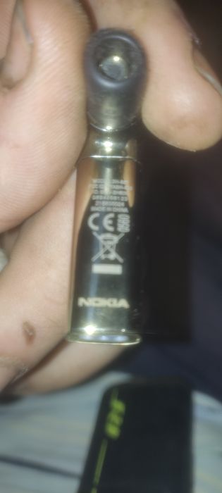 Коллекционная золотая Bluetooth-гарнитура Nokia J (BH-806 Gold) от Oro