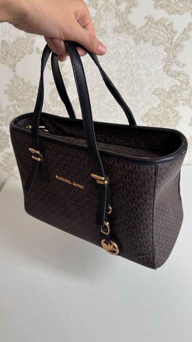 Женская сумка в коричневом цвете