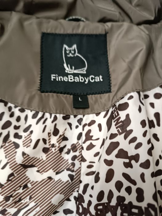 Продам пуховик серого цвета